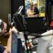 Emily Bodkins smiles as she and her four-year-old son Peter, both of Eaton Rapids, peer through a window during a live broadcast of the Mott Takeover at 1050 WTKA on Friday, May 17, 2013. Melanie Maxwell I AnnArbor.com